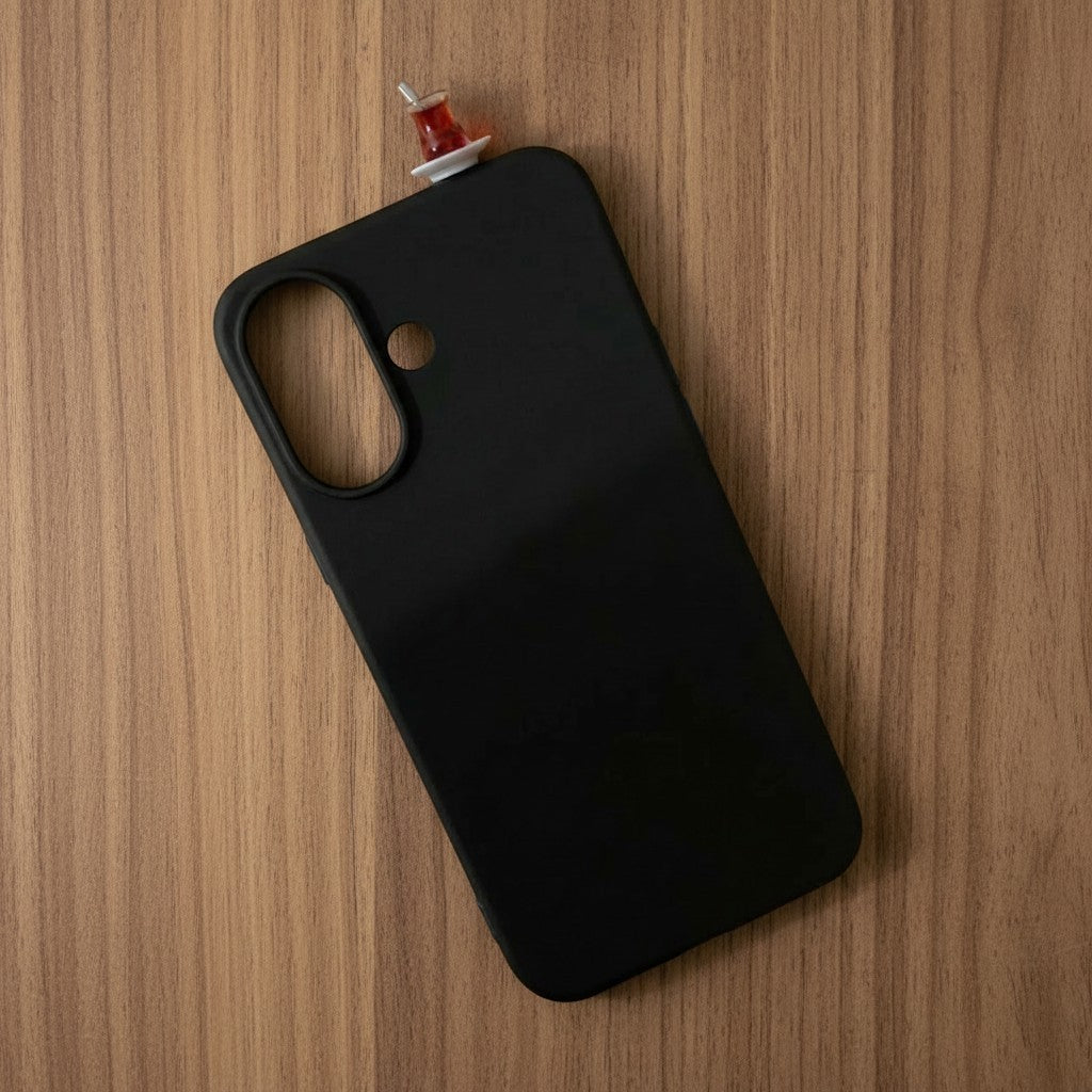 digitaley.co black premium silicone phone case with a miniature red tea glass motif on top.