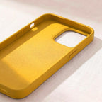 digitaley.co mustard gold iPhone case, premium matte silicone with soft-touch finish and microfiber lining.