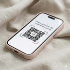 DigitaleyHub Smart-Ink customizable iPhone case with E-Ink display showing a QR code.
