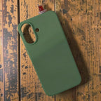 digitaley.co green silicone phone case with a miniature tea glass motif on top. Slim-waist design.
