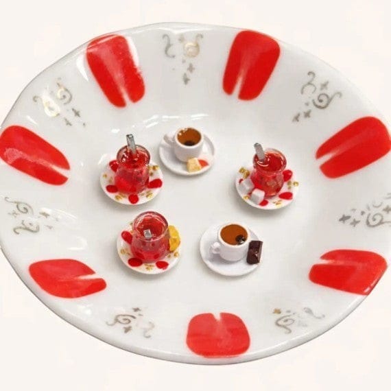 digitaley.co white silicone iPhone case with a red tea-spirit motif, slim-waist tea glasses, and coffee cups.