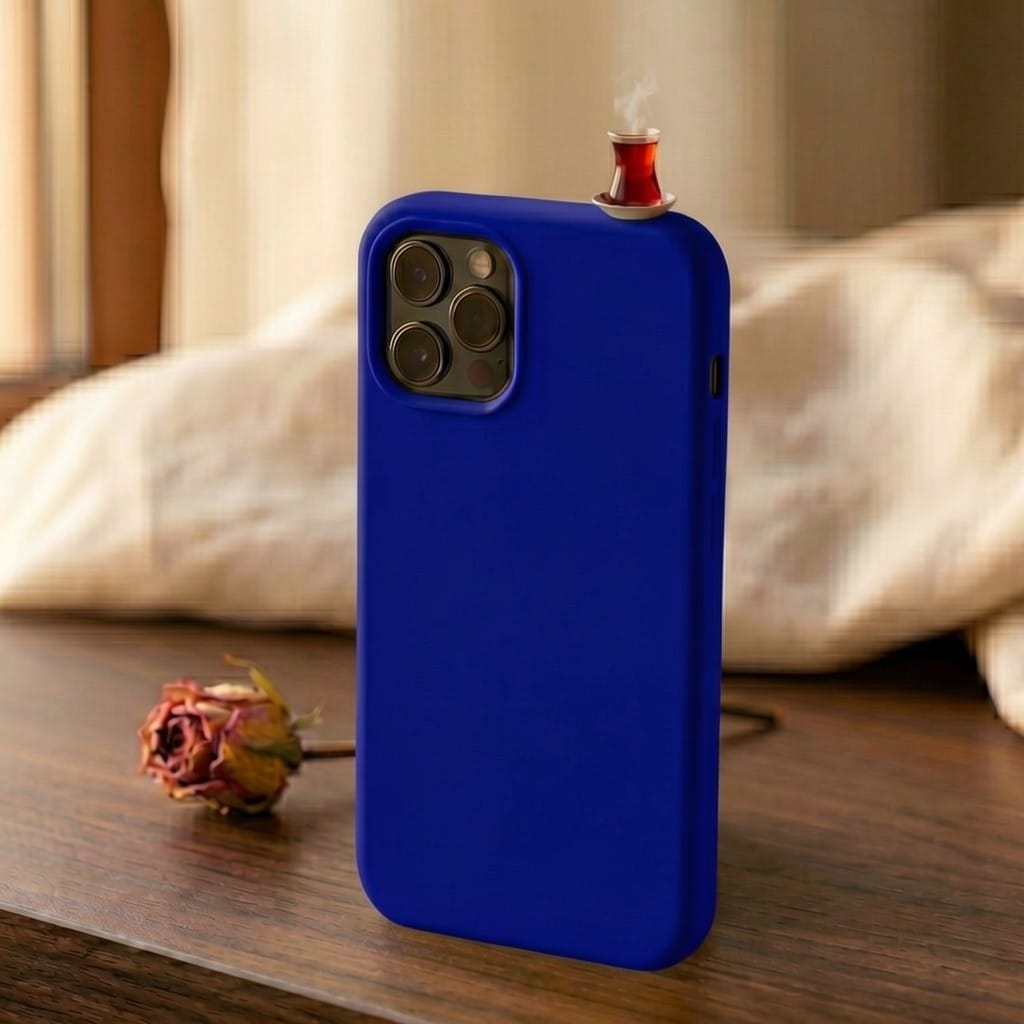 digitaley.co mustard yellow silicone iPhone case with a miniature steaming tea glass motif on top.
