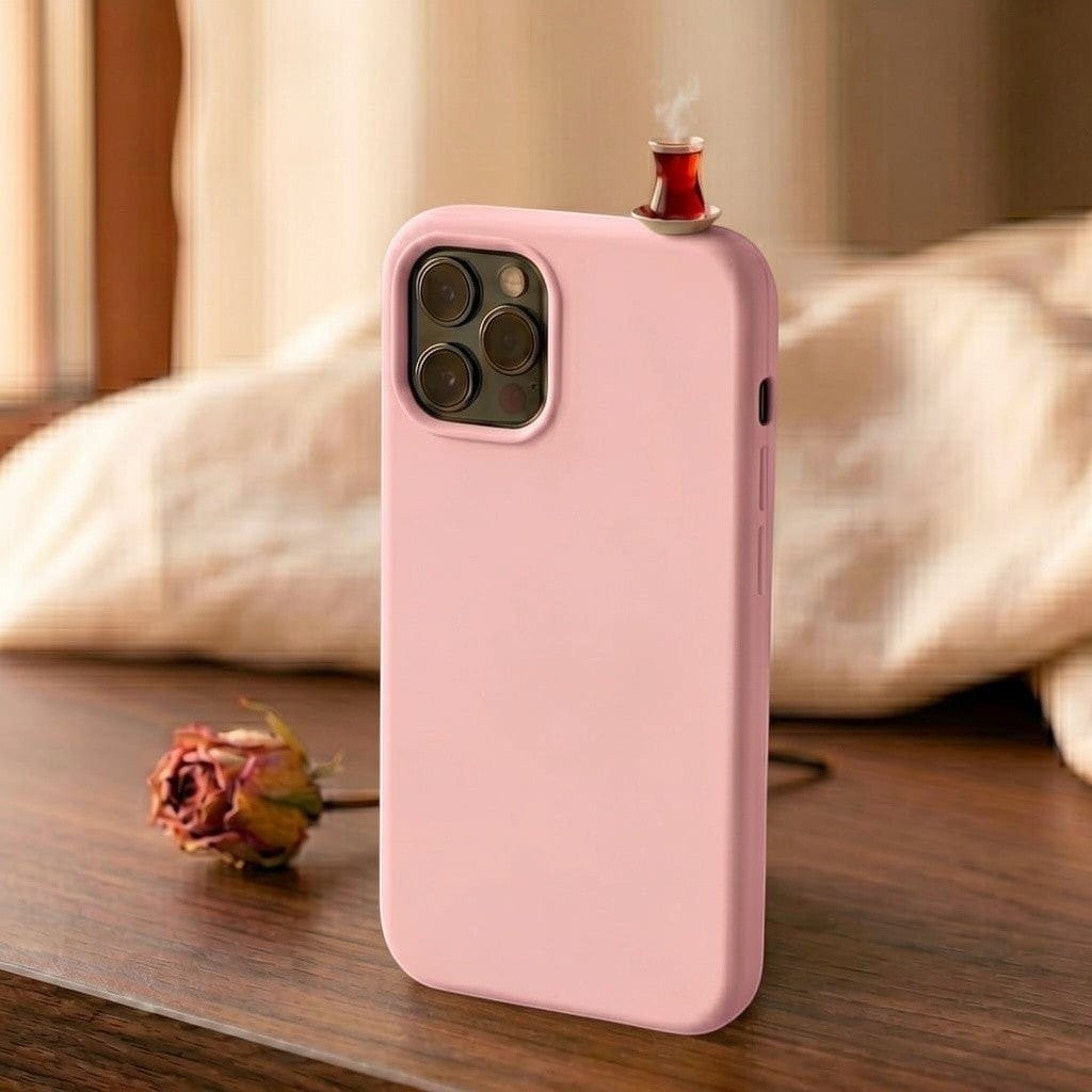 digitaley.co pink silicone iPhone case with a miniature steaming tea glass motif on top.