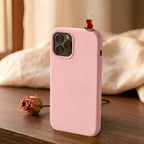 digitaley.co pink silicone iPhone case with a miniature steaming tea glass motif on top.