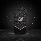 digitaley.co black iPhone case with sparkling crystal embellishments and a white swan motif. Features a chevron pattern of crystals at the bottom.