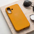 digitaley.co mustard yellow silicone phone case with velvet lining and raised camera protection.