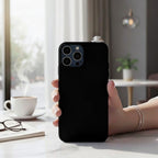 Black phone case with a 3D miniature Turkish coffee cup and two Turkish delights on a saucer.