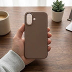 digitaley.co coffee brown minimalist silicone phone case with velvet lining and raised camera protection.