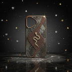digitaley.co iPhone case with snake motif, embellished with crystals and textured snake print. Brown trim.